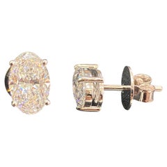 GIA Certified 4.00 Carat D/VS1 Oval Diamond Stud Earrings in 18K White Gold