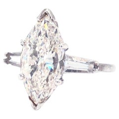 GIA Certified 4.00ct Marquise Cut Diamond Ring with Tapered Baguette Cut Diamond