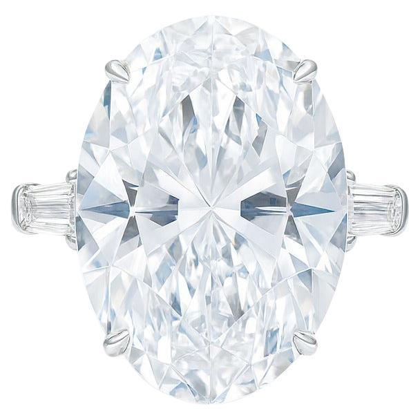 GIA Certified 4.01 Carat D Color Flawless Oval Diamond Platinum Tapered Baguette For Sale