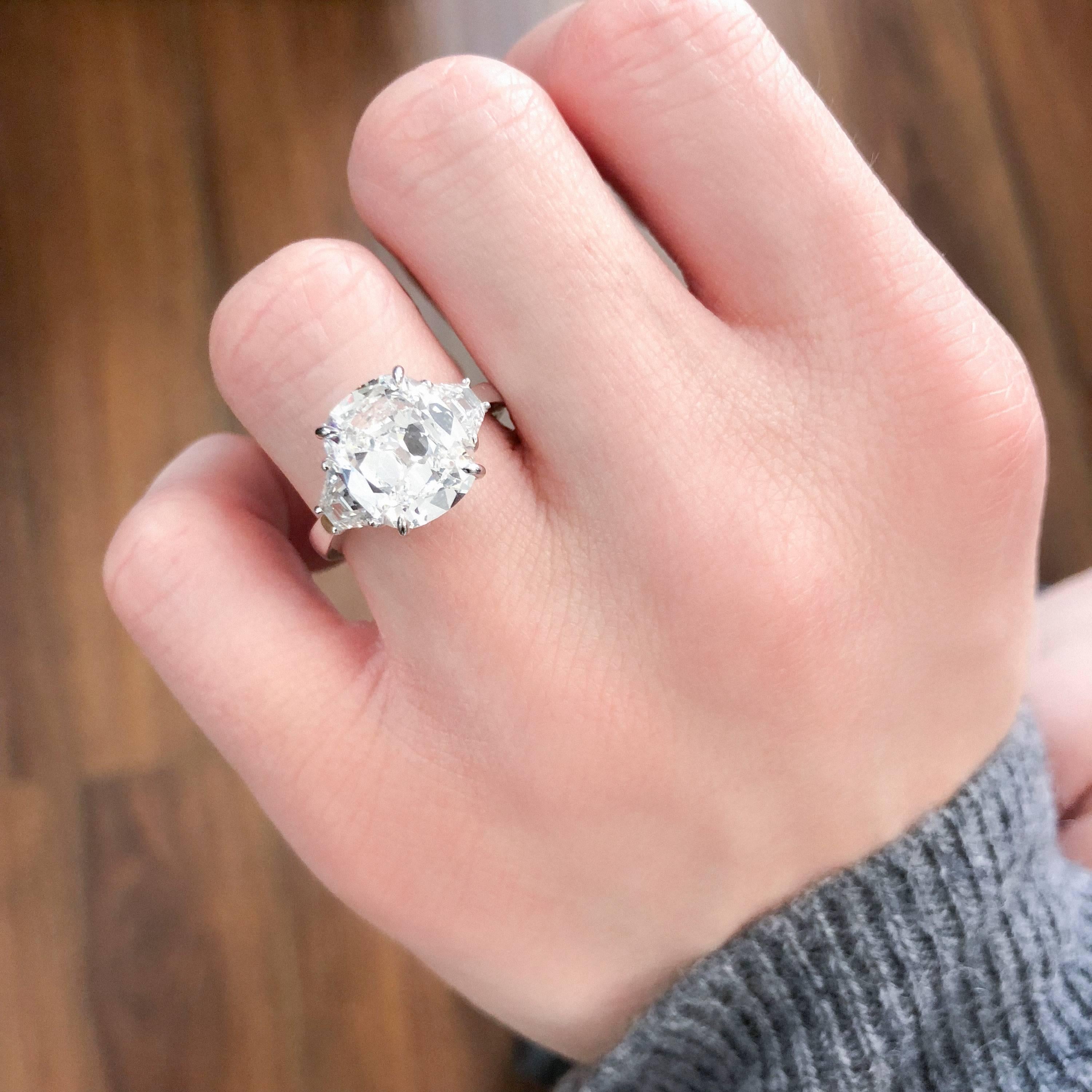 4.01 ct D VS2 cushion brilliant diamond with GIA certificate
0.72 tw trapezoid sidestones
Platinum size 6
A true cushion brilliant with beautiful faceting - NOT the crushed ice look. 