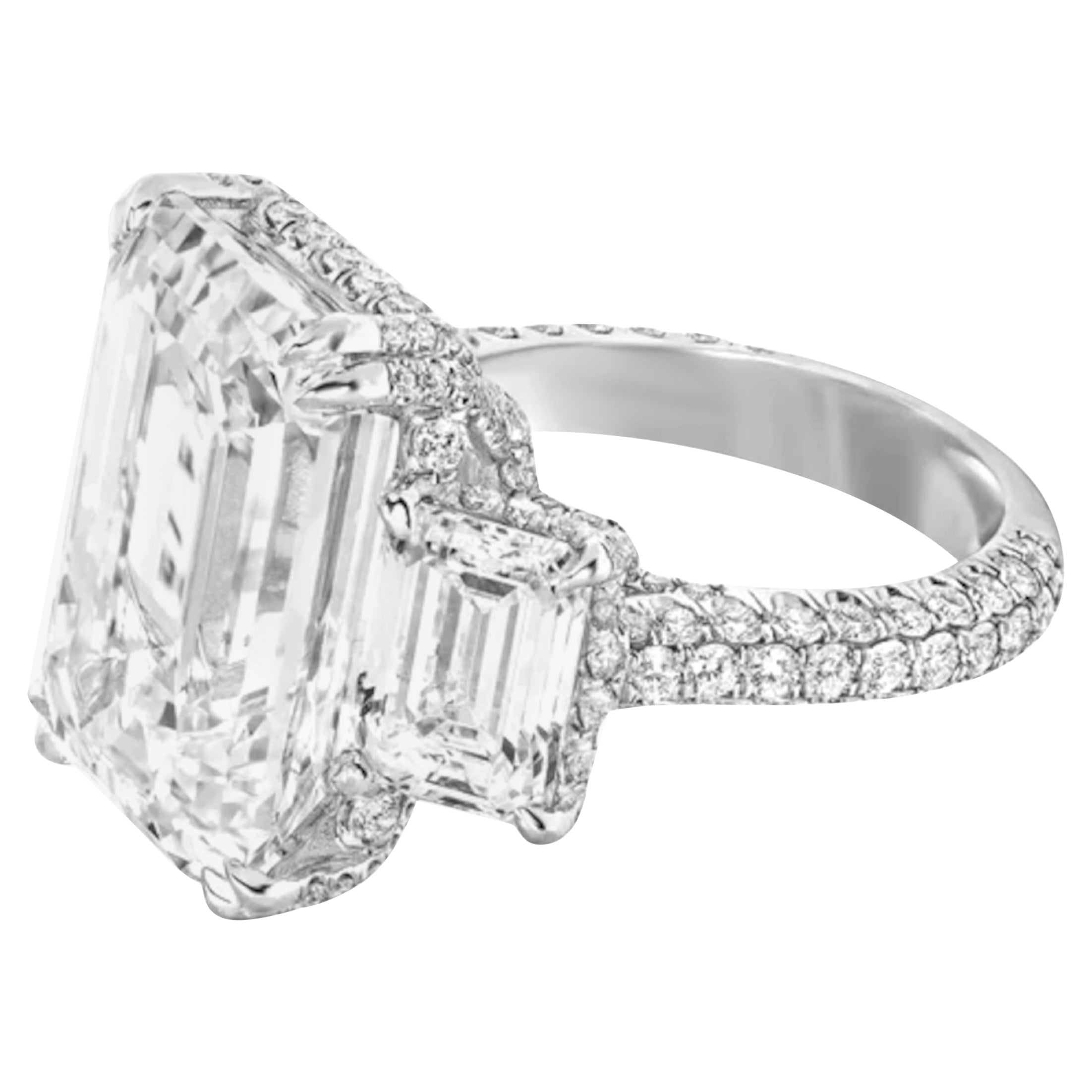 Contemporary GIA Certified 4.01 Carat G VS2 Emerald Cut Diamond Three-Stone Ring For Sale