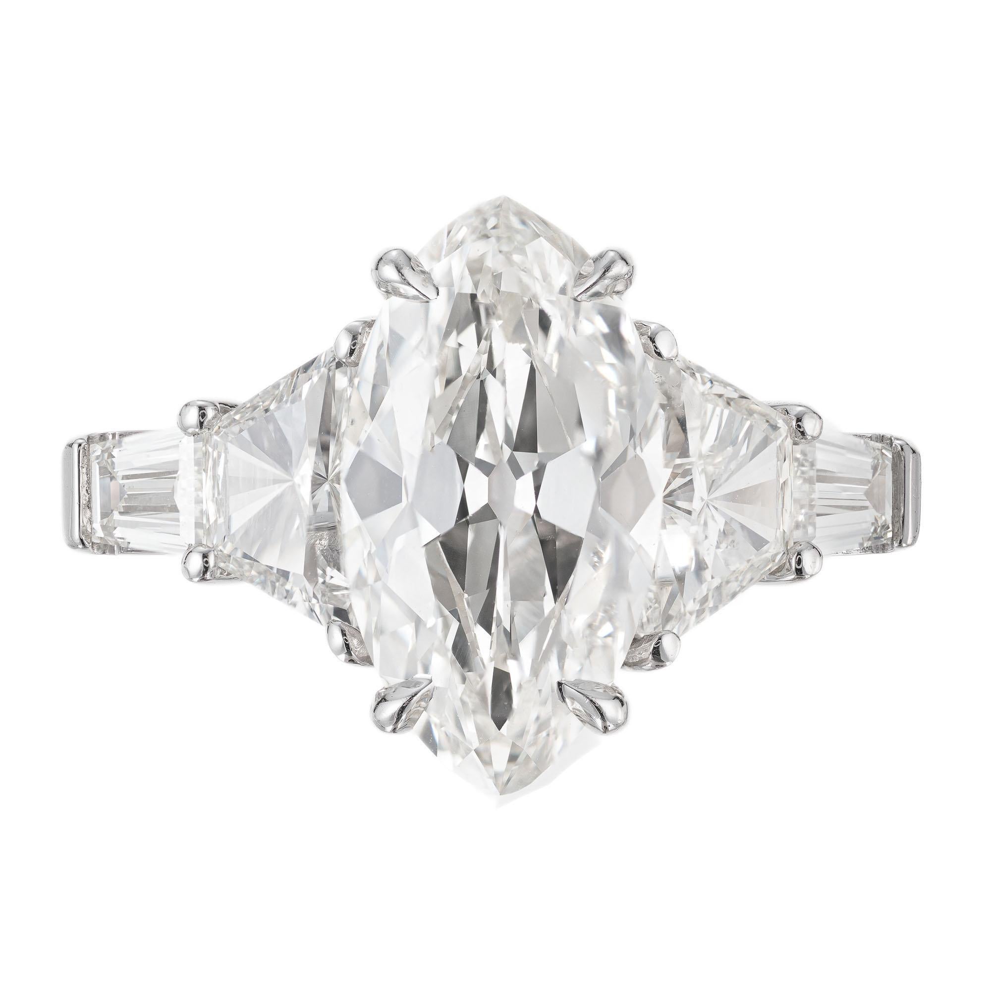 1920's Diamond engagement ring. GIA certified 4.01ct marquise center diamond with two 1.17ct trapezoid's and two .62ct baguette side diamonds, in a platinum setting. All five stones have great brilliance. 

1 Marquise diamond, approx. total weight