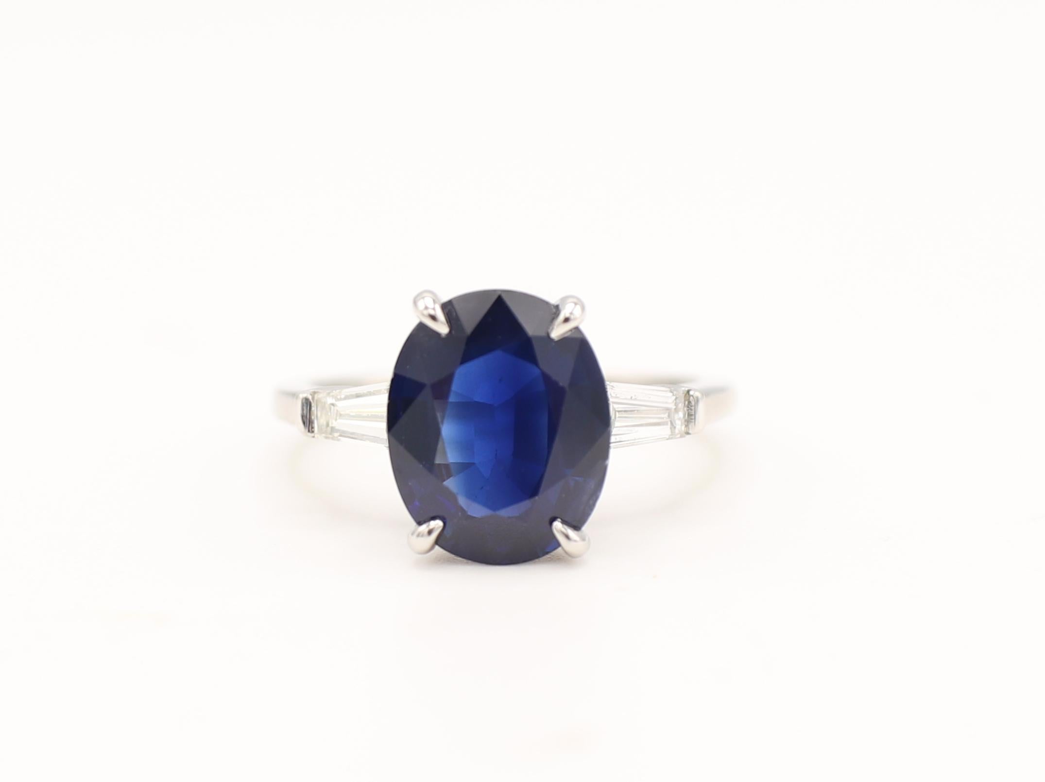 GIA Certified 4.01 Carat Oval Blue Sapphire Platinum Diamond Engagement Ring 
GIA Report Number: 6214903128
Sapphire: Natural 4.01 carat oval, blue (see GIA report pictured for details)
Diamond: Approx. .40 CTW G VS
Metal: Platinum
Weight: 4.88