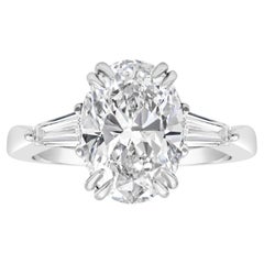 GIA Certified 4.01 Carats Oval Cut Diamond Three-Stone Engagement Ring