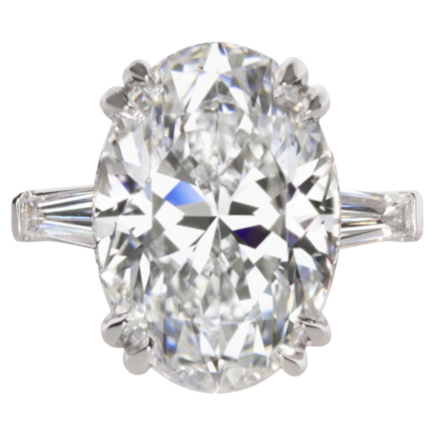 GIA Certified 4.01 Carat Oval Diamond D Color Ring with Tapered Baguette For Sale