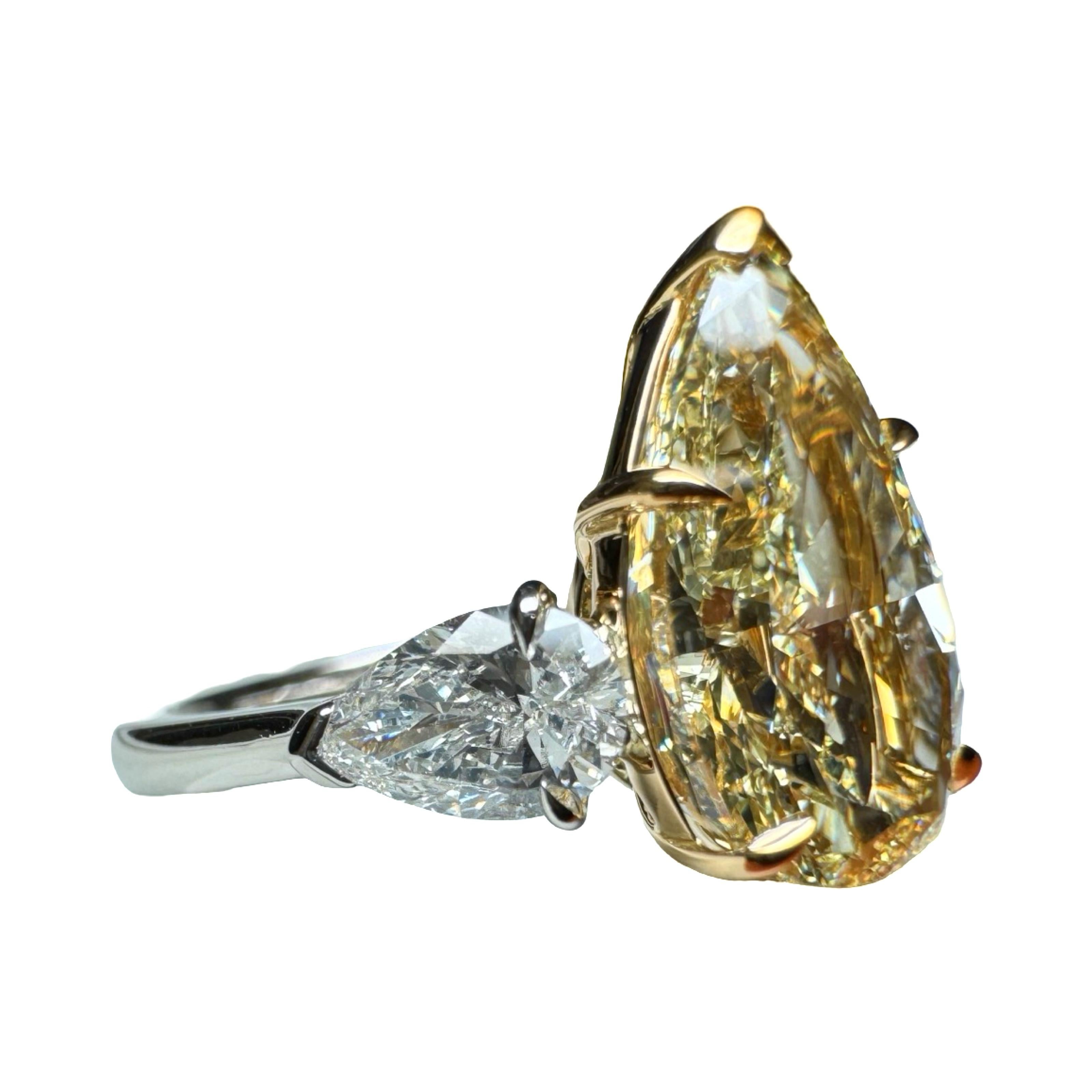 GIA Certified 4.01 Carat Pear Cut Yellow Diamond 3 Stone Ring In New Condition For Sale In New York, NY