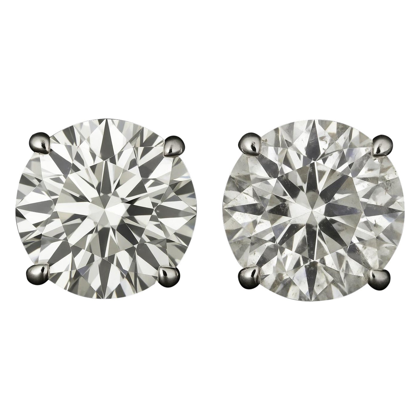 Coppia di diamanti tondi e brillanti certificati GIA da 4,01 carati in vendita