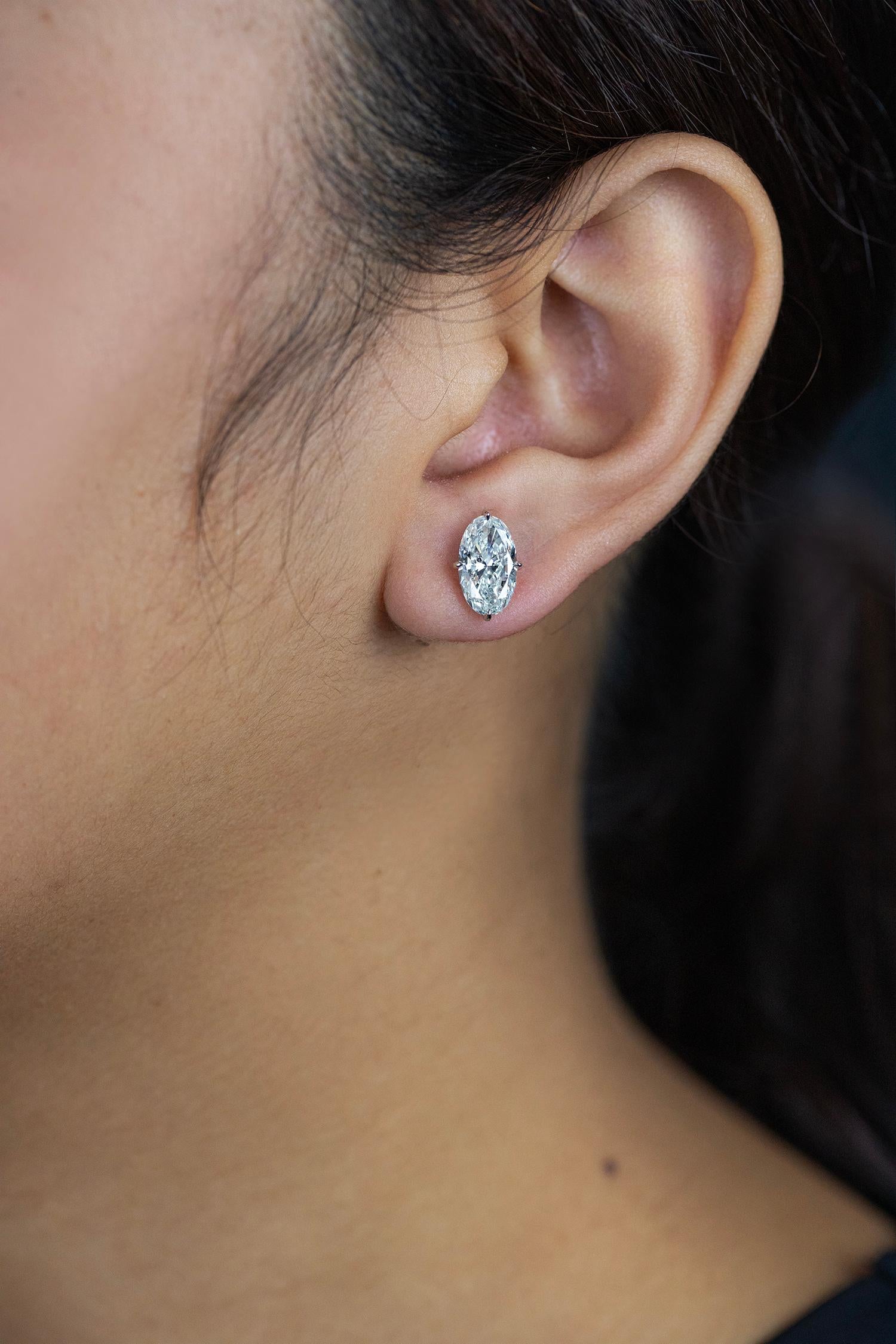 Contemporary GIA Certified 4.01 Carats Elongated Oval Brilliant Cut Diamond Stud Earrings For Sale