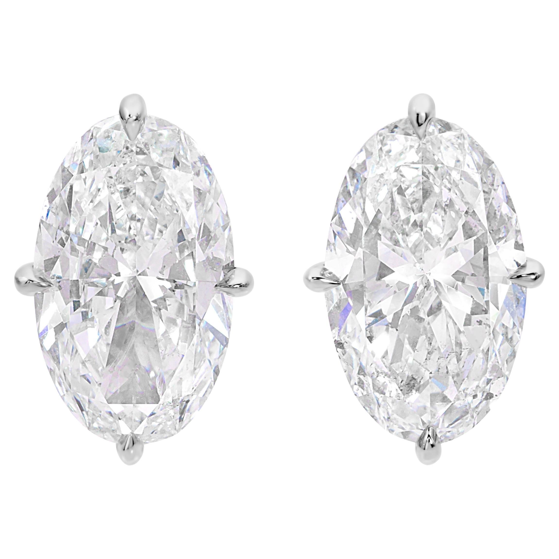 GIA Certified 4.01 Carats Elongated Oval Brilliant Cut Diamond Stud Earrings For Sale