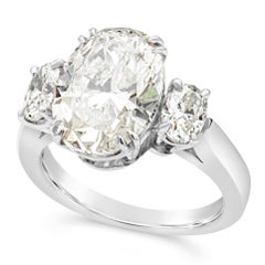 GIA Certified 4.01 Carats Oval Cut Diamond Three-Stone Engagement Ring