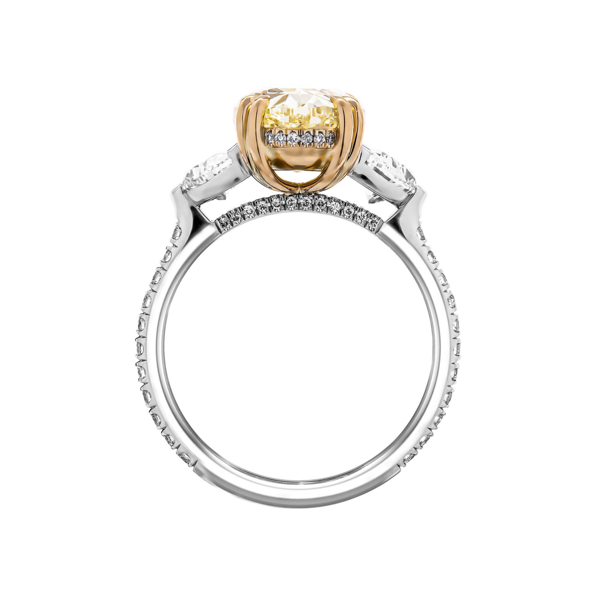 Mounted in handmade custom design setting featuring Platinum 950 & 18K Yellow Gold with pave on the shank 
Setting features exceptional pave work, delicate yet sturdy, includes approximately 0.28ct of small full brilliant cut diamonds.
 Side stones