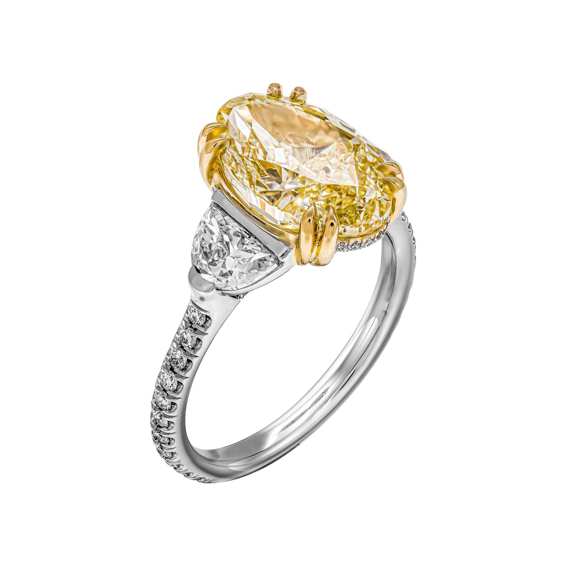 Oval Cut GIA Certified 4.01ct Oval Fancy Light Yellow Three-Stone Ring