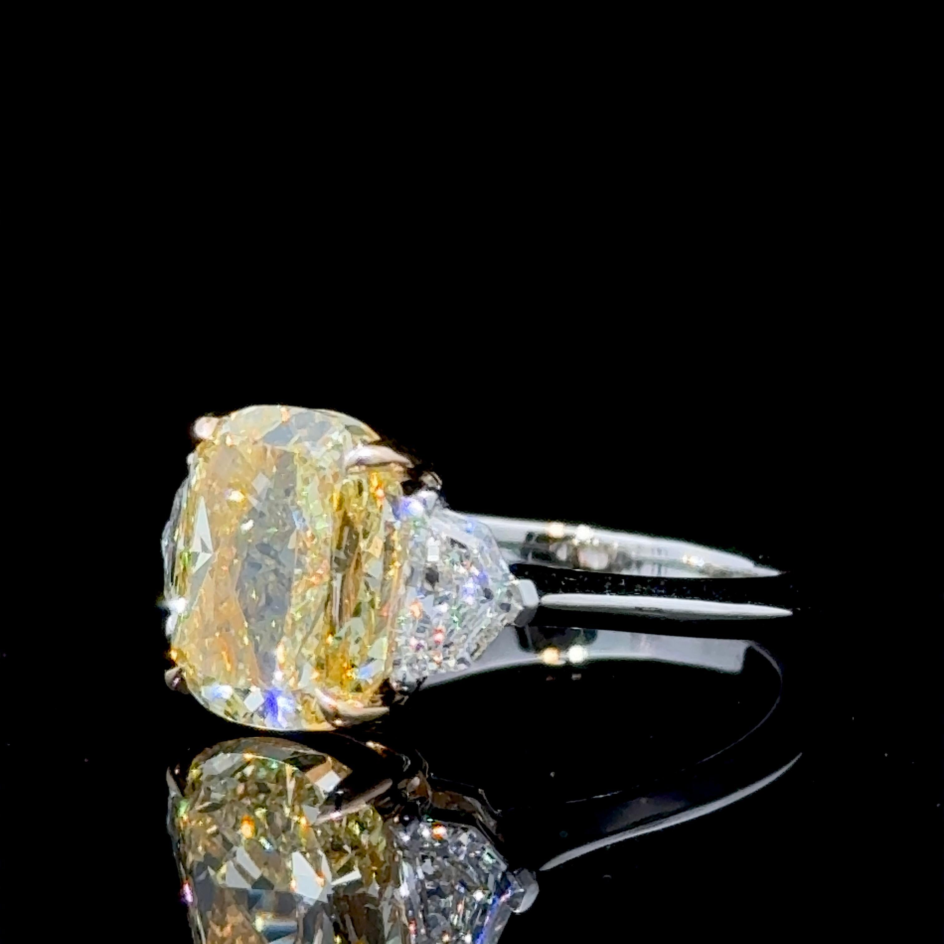 Amongst Cushion Cut Yellow Diamonds, Elongated Pillow Shapes are the most coveted and desired outlines
They look larger than their weight suggests, and they look like true gems..

Our vibrant and pure GIA Certified 4.02 Carat Cushion Cut Fancy
