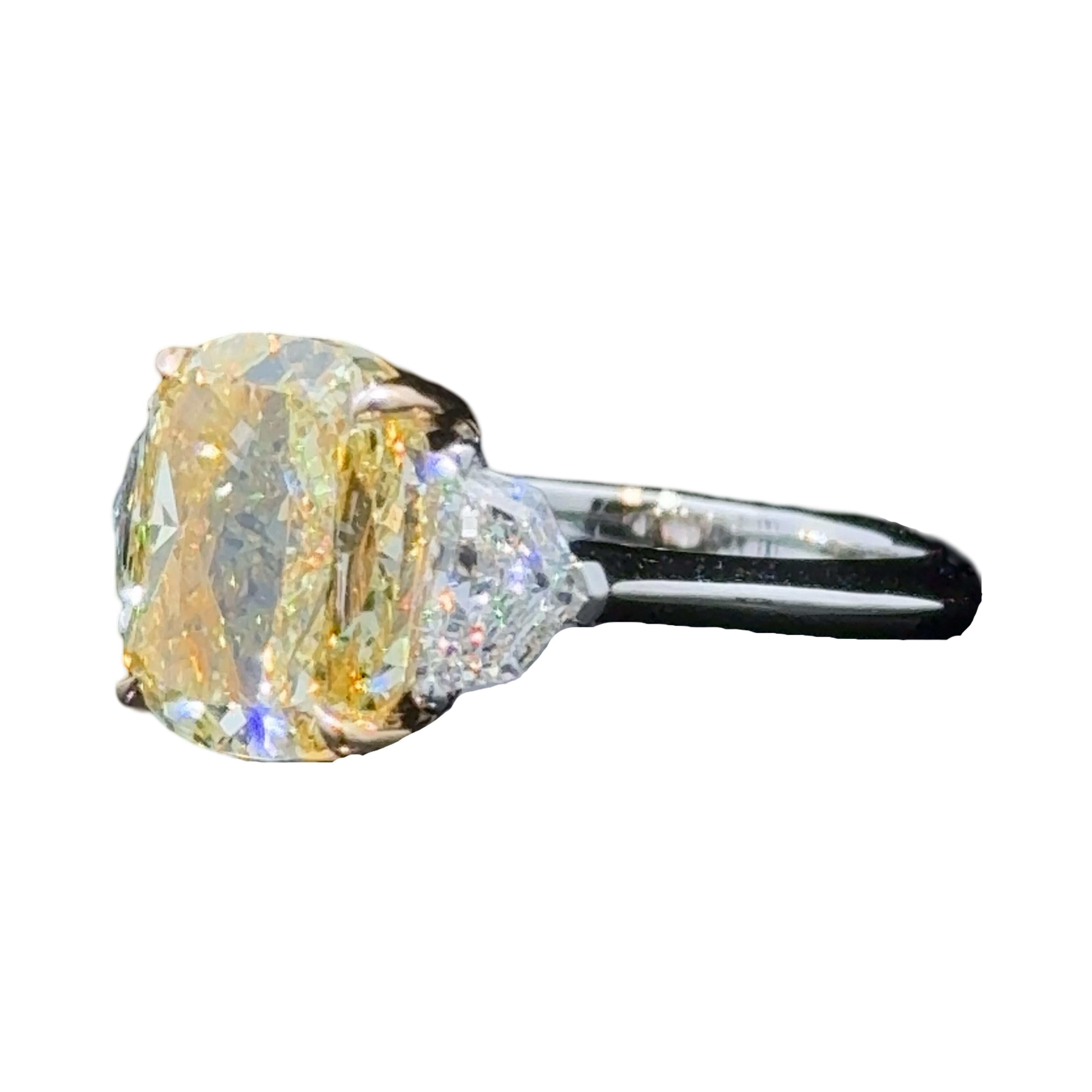 GIA Certified 4.02 Carat Cushion Cut Fancy Yellow Diamond Three Stone Ring For Sale 2