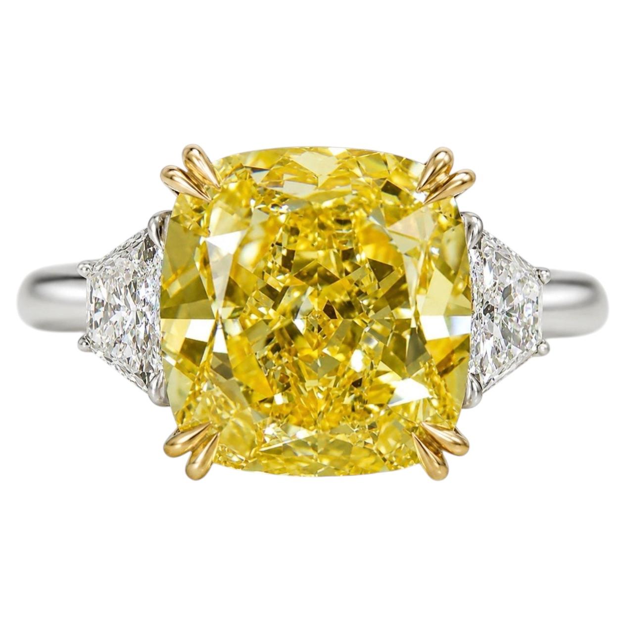GIA Certified 4.02 Carat Cushion Cut Fancy Yellow Diamond Three Stone Ring