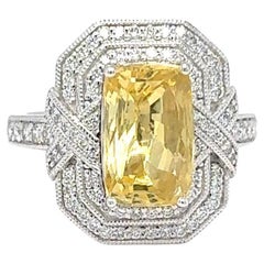 Anello di diamanti con zaffiro giallo con taglio a cuscino senza calore certificato GIA da 4,02 carati
