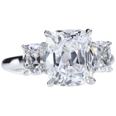 GIA Certified 4.02 Carat F/VVS2 Antique Cushion Diamond Three-Stone Ring