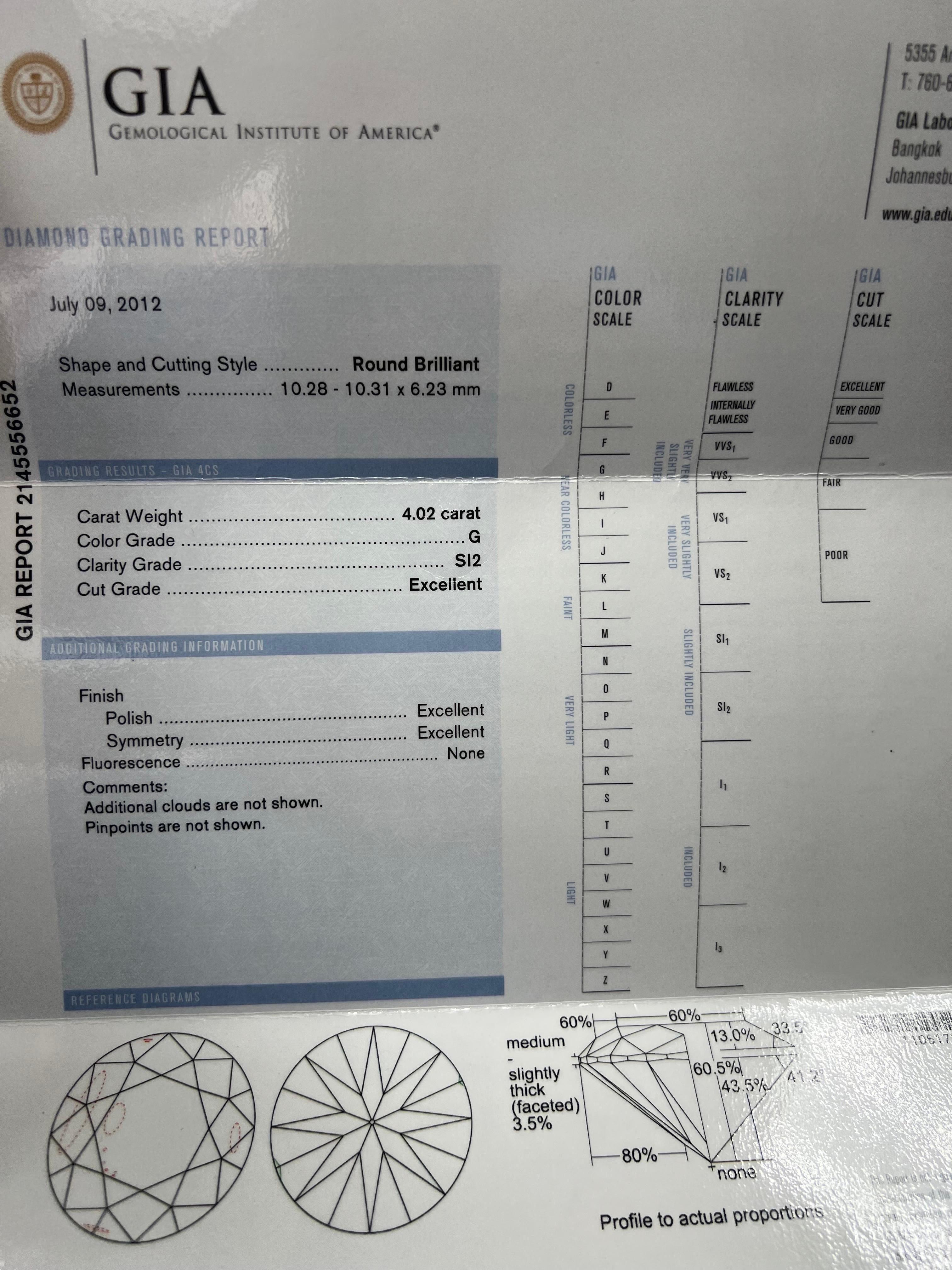 GIA Certified 4.02 Carat G SI2 EX Cut None Natural Round Diamond Engagement Ring.

Exceptional GIA certified (#2145556652) natural 4.02 carat round brilliant diamond, graded as a G in color, SI2 in clarity, No Fluorescence. Excellent Cut, Polish and