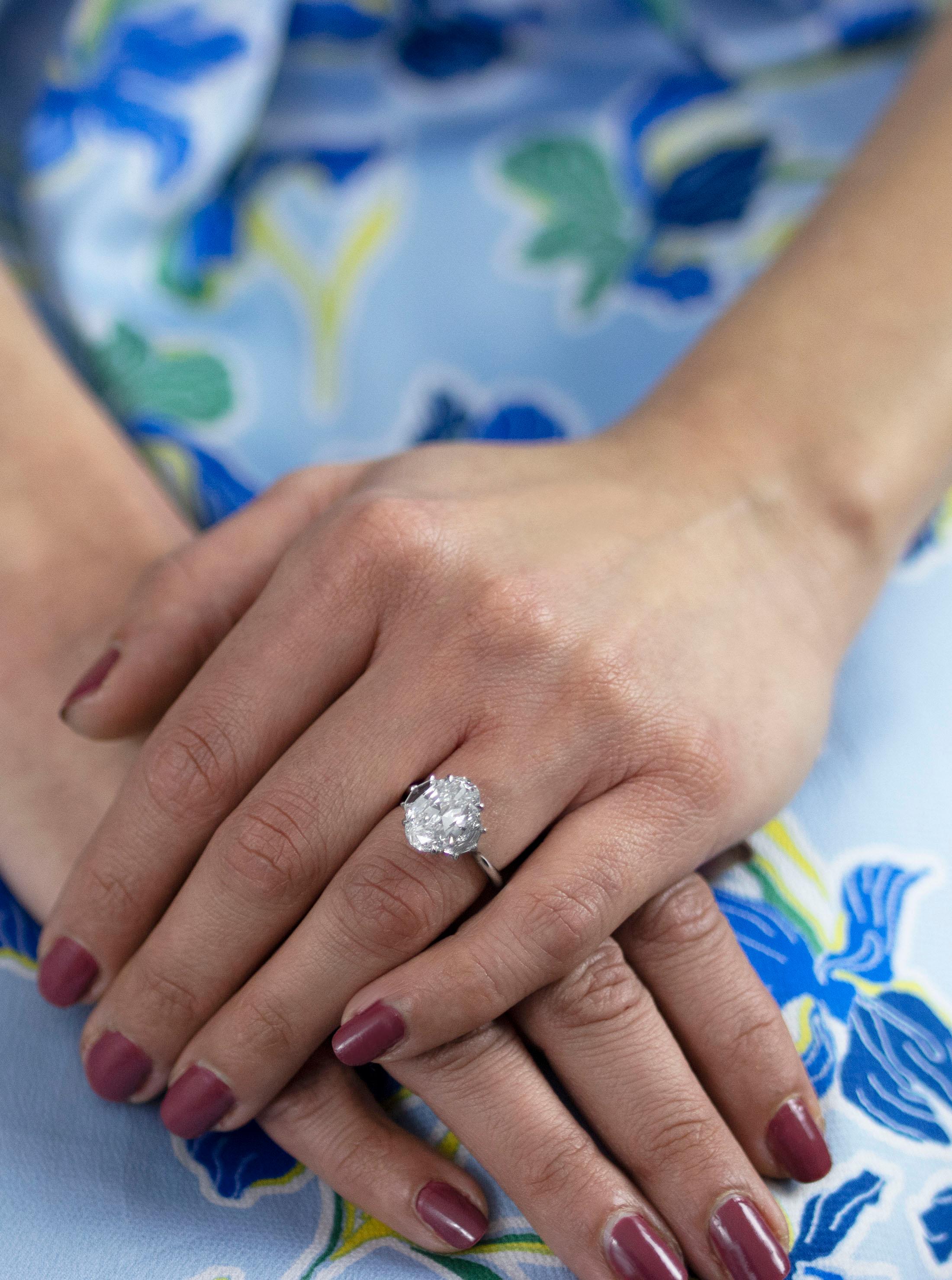 Women's GIA Certified 4.02 Carat Oval Cut Diamond Three-Stone Engagement Ring