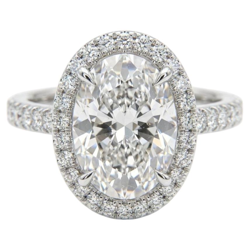 GIA Certified 4.02 Carat Oval Cut F Color VS2 Clarity Diamond Ring with Halo