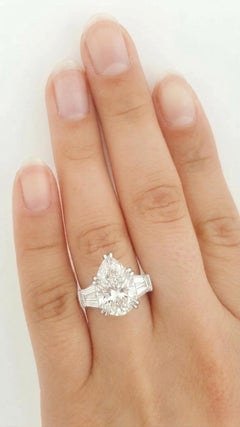 GIA Certified 4.02 Carat Pear Brilliant Diamond Three-Stone Ring