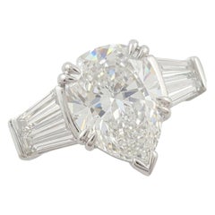 GIA Certified 4.02 Carat Pear Brilliant Diamond Three-Stone Ring