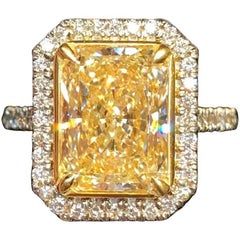 GIA Certified 4.02 Carat UV Color Yellow Diamond Halo Ring