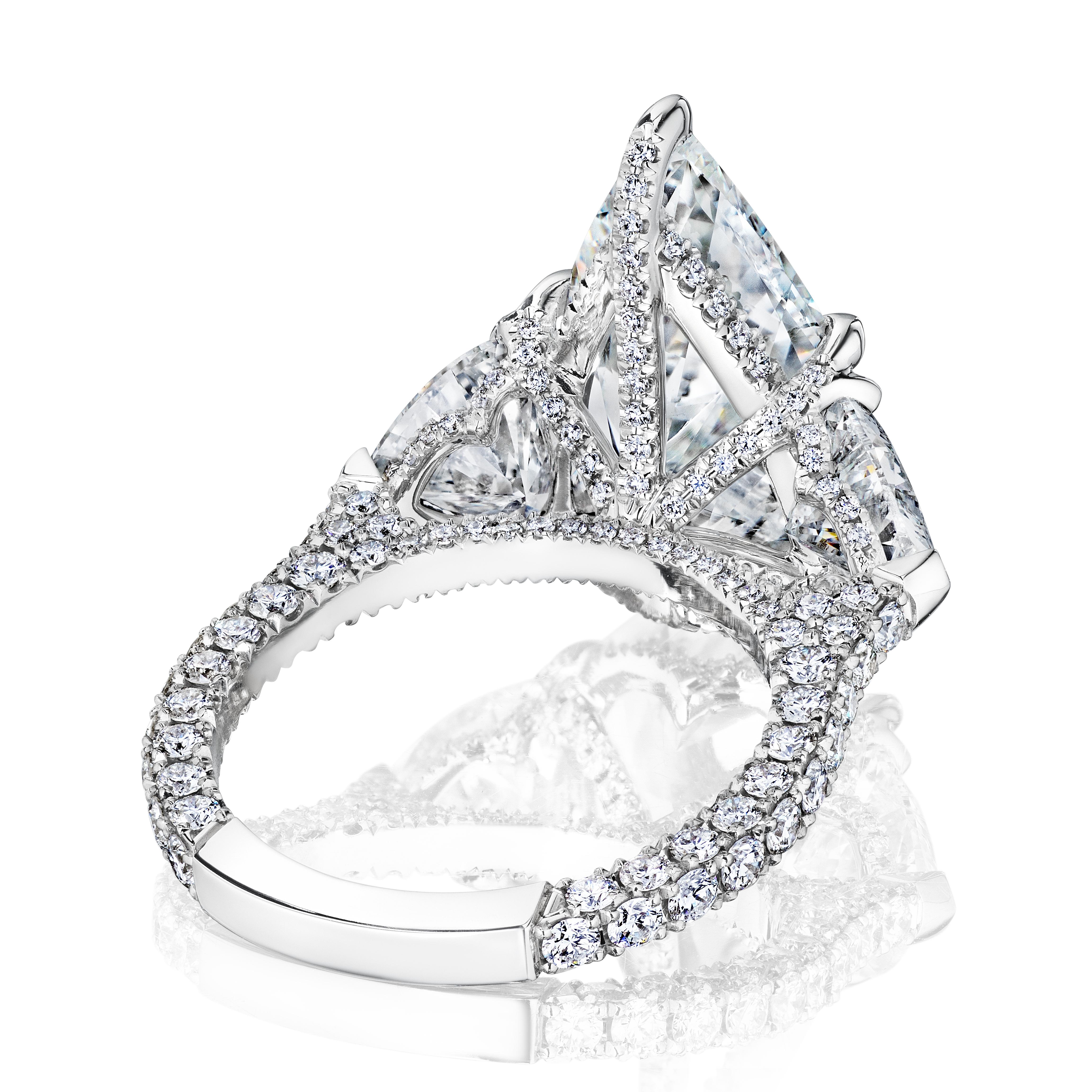 Introducing 'Kristen,' a masterpiece of artistry and elegance, this engagement ring is crowned with a GIA Certified 4.02-carat pear-shaped diamond, boasting a color grading of 'D'—the highest color grade awarded by the Gemological Institute of
