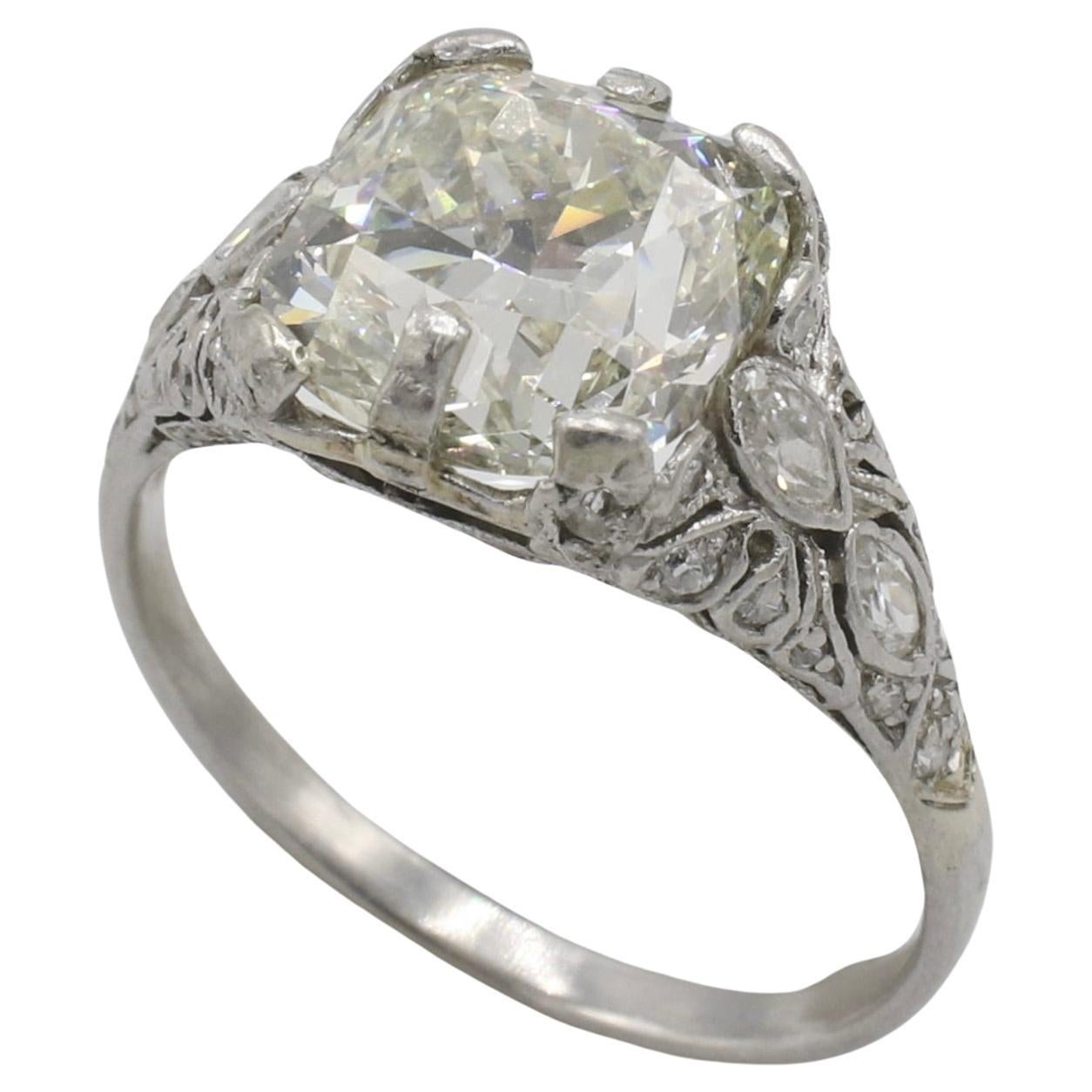 GIA Certified 4.03 Carat Cushion Natural Diamond Art Deco Engagement Ring
Metal: Platinum
Weight: 5.4 grams
GIA report number: 2231133161
Diamond: 4.03 carat cushion M VS2 natural diamond 
Accent diamonds: Marquise & round natural diamonds, approx.