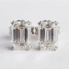 GIA Certified 4.02 Carat Emerald Cut VVS2 Clarity Diamond Studs Earrings