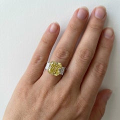 GIA Certified 4.03 Carat Fancy Yellow Diamond Three-Stone Ring