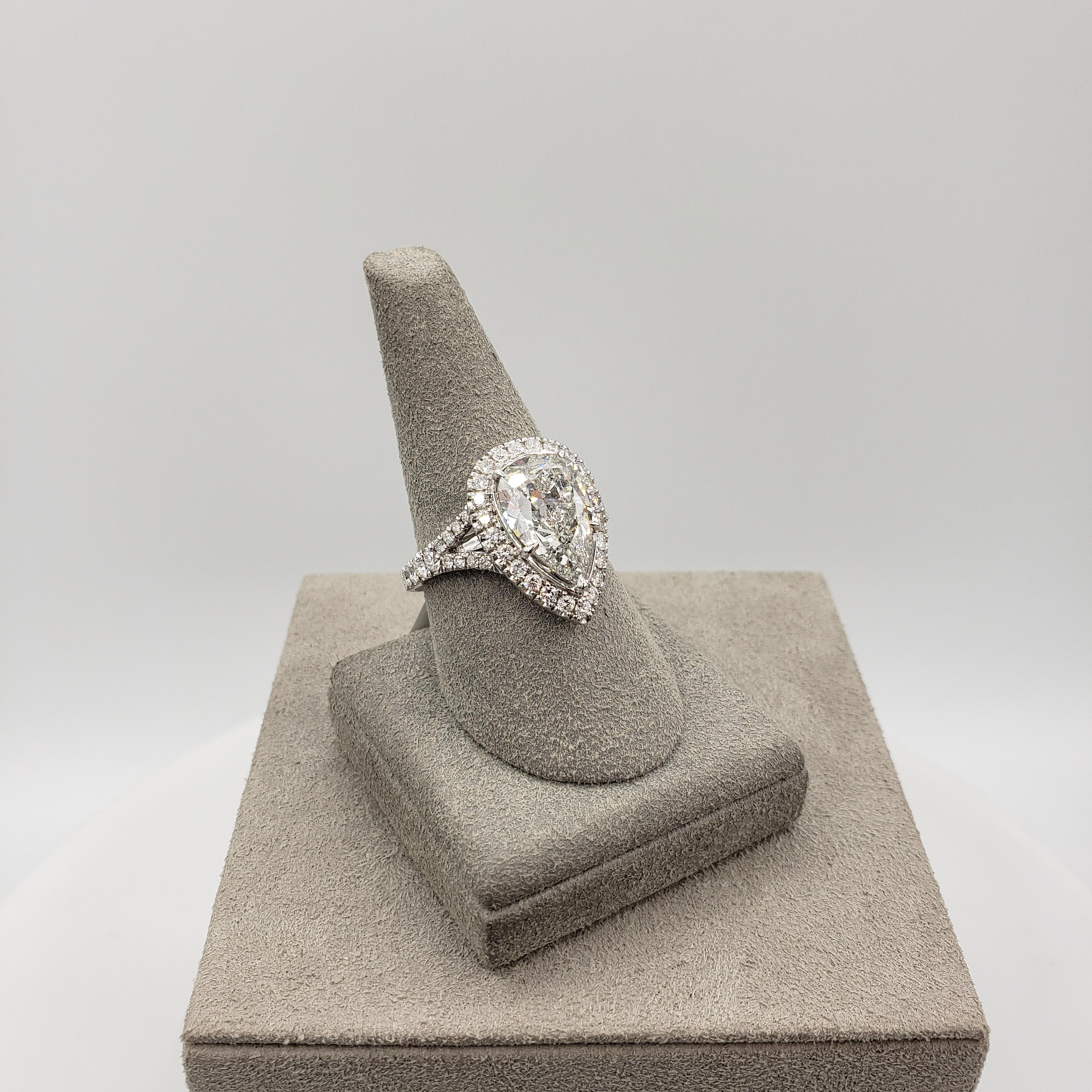 Pear Cut GIA Certified 4.03 Carats Pear Shape Diamond Halo Engagement Ring in White Gold For Sale