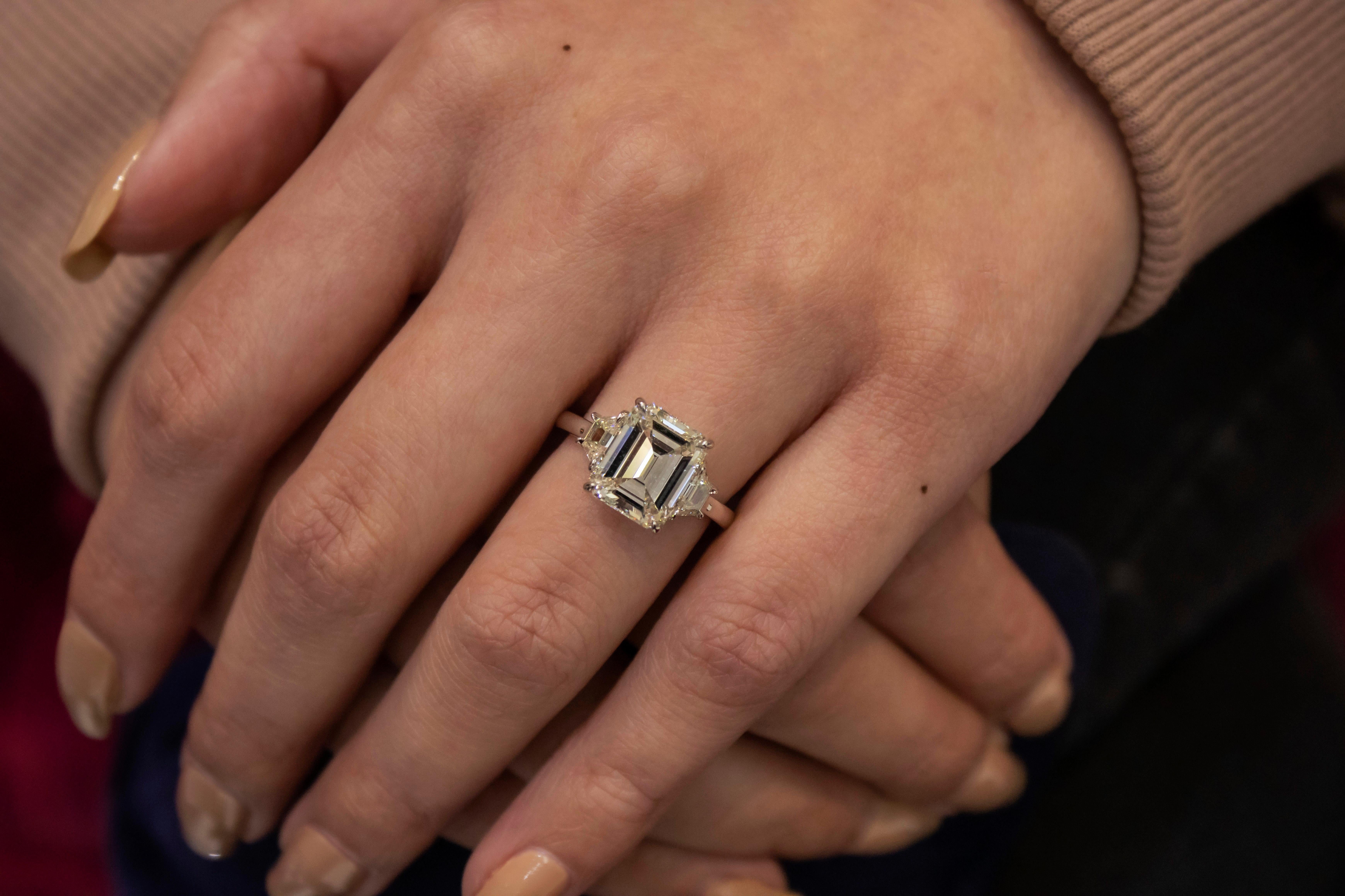 Women's GIA Certified 4.05 Carat Emerald Cut Diamond Three-Stone Engagement Ring