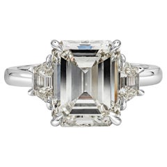 GIA Certified 4.05 Carat Emerald Cut Diamond Three-Stone Engagement Ring