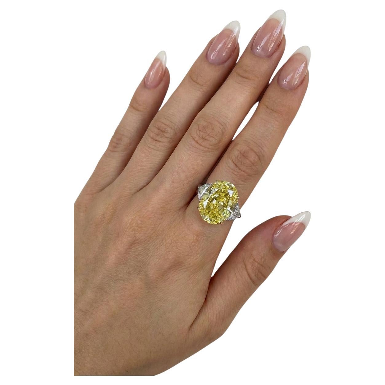 Bague à diamant ovale certifié GIA de 4,05 carats jaune intense VS2
