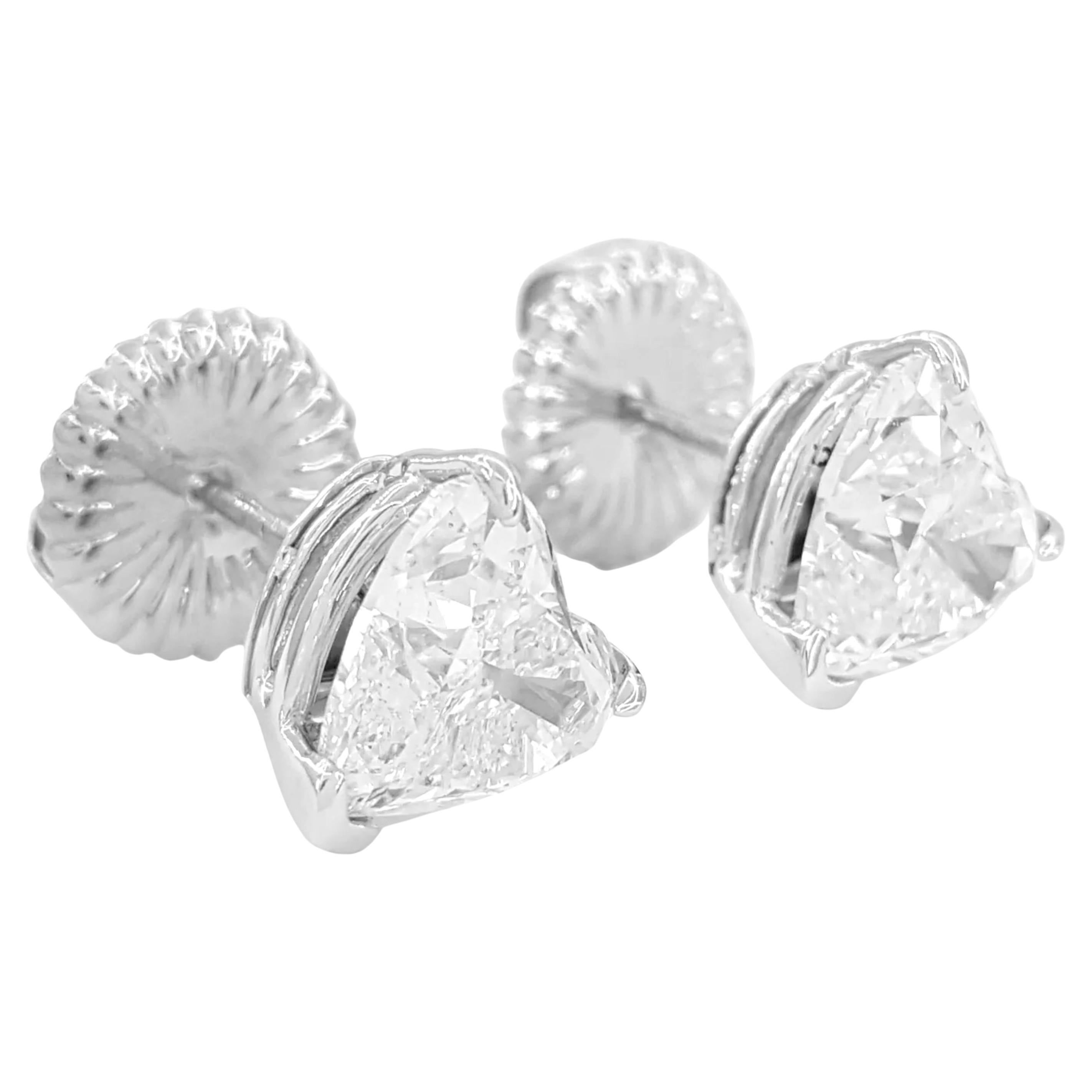 Pendientes de platino con diamantes talla brillante corazón de 4 quilates certificados por el GIA Corte de corazón en venta