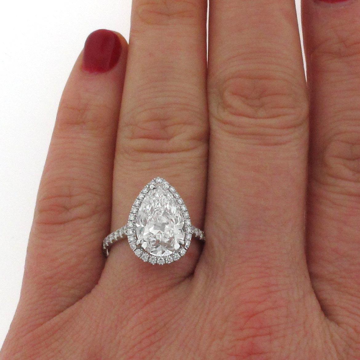 GIA Certified 4.05 F/Si1 Pear Shape Diamond Halo Engagement Ring In Excellent Condition In Beverly Hills, CA