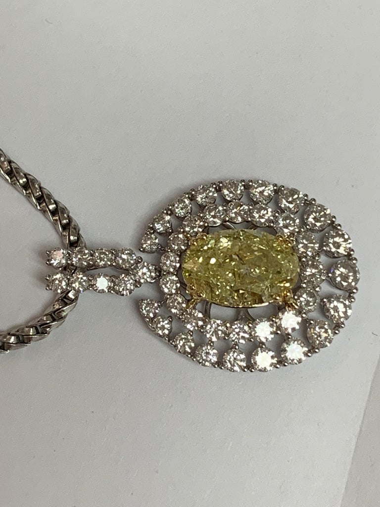 GIA Certified 4.06 Oval Yellow Center and White Diamond Pendant at 1stDibs