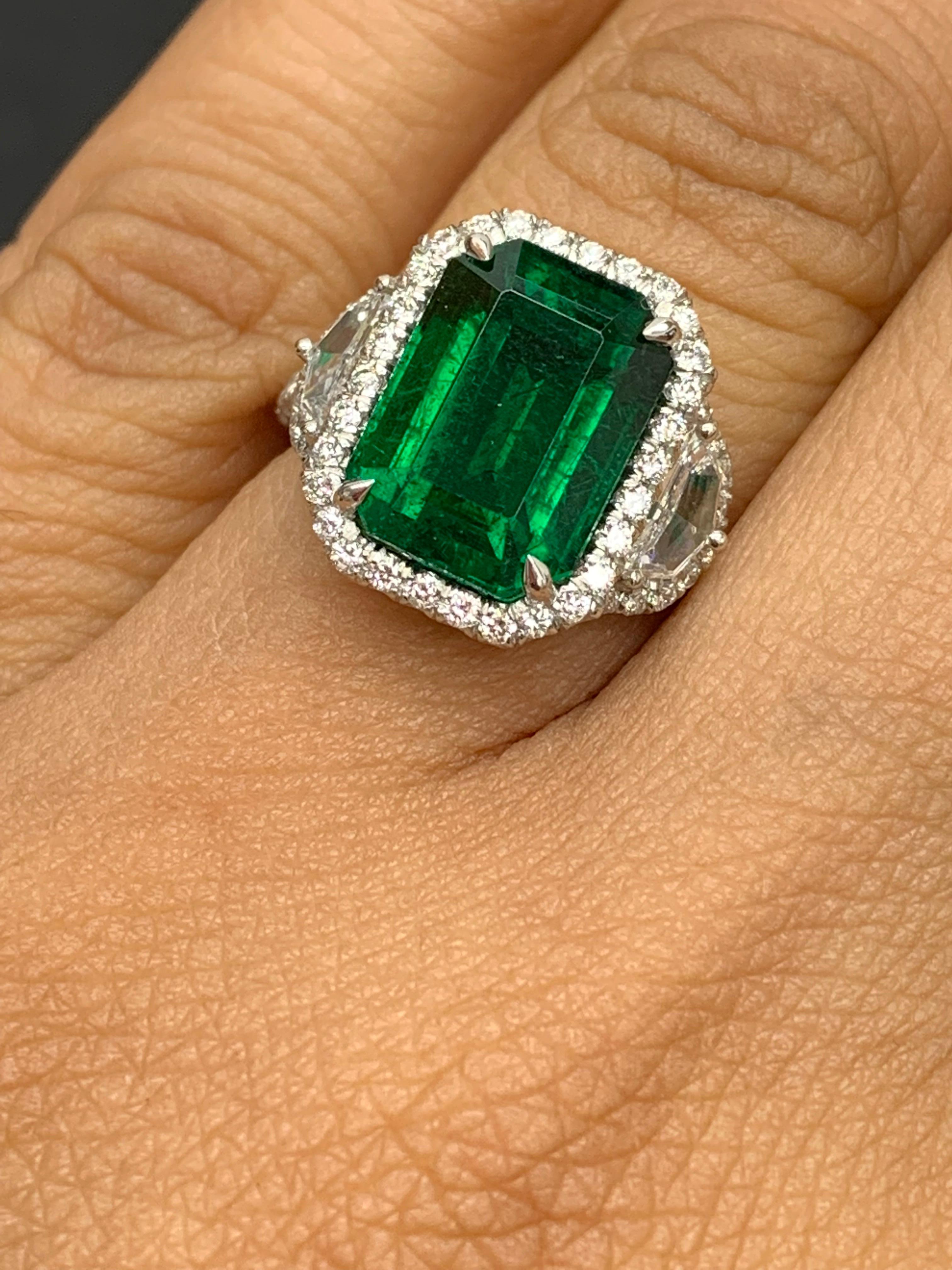 Modern GIA Certified 4.07 Carat Emerald Cut Emerald Diamond 3 Stone Ring in Platinum For Sale