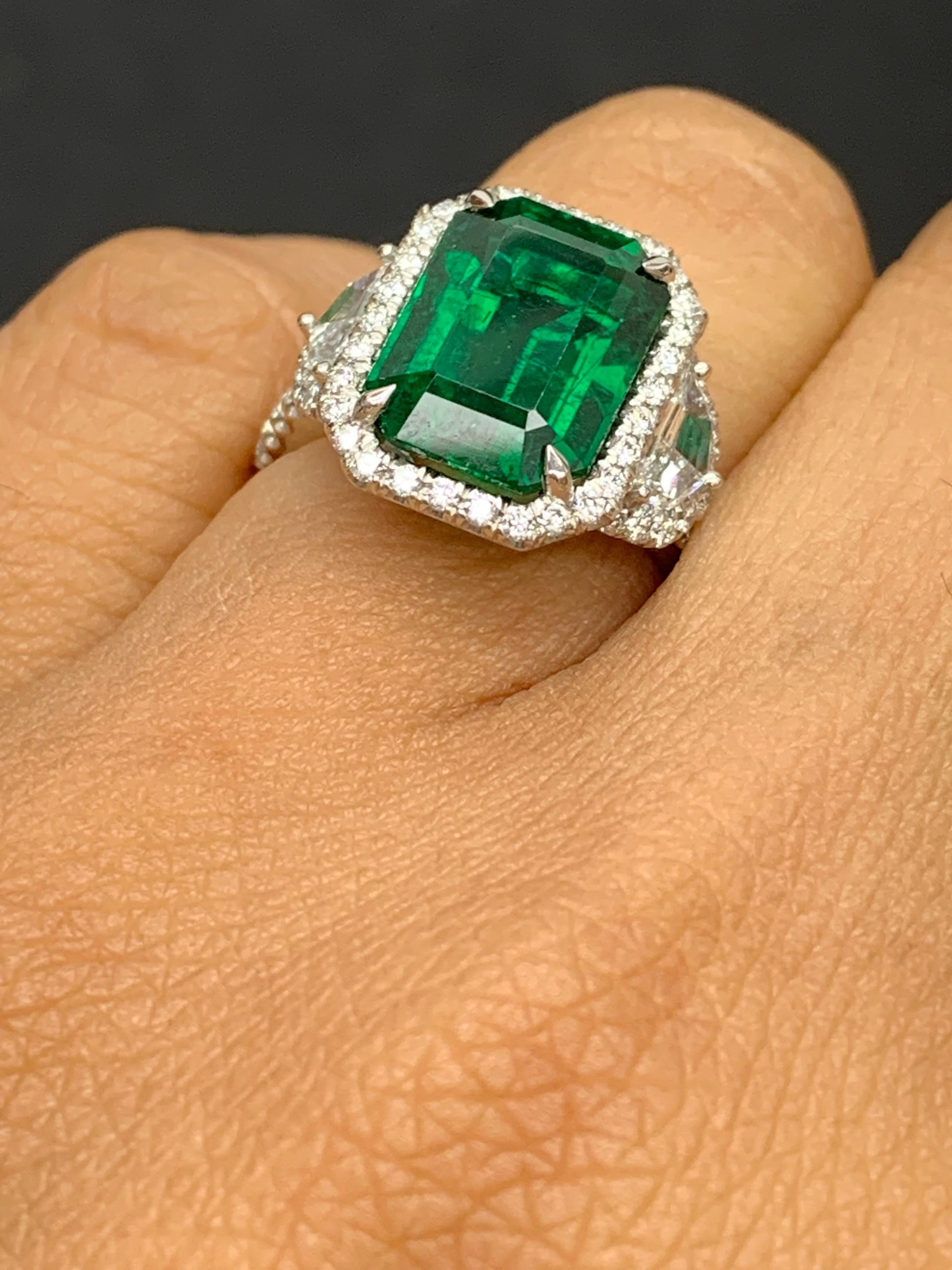 GIA Certified 4.07 Carat Emerald Cut Emerald Diamond 3 Stone Ring in Platinum In New Condition For Sale In NEW YORK, NY
