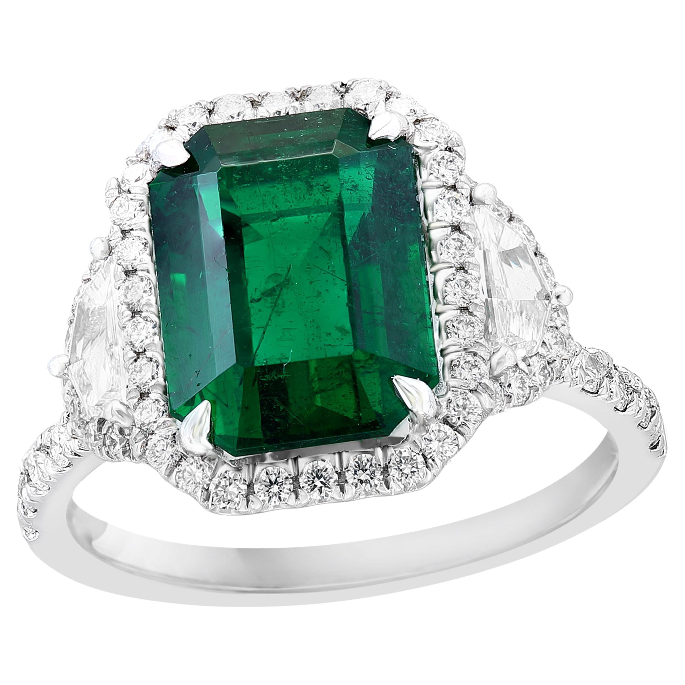 GIA Certified 4.07 Carat Emerald Cut Emerald Diamond 3 Stone Ring in Platinum For Sale