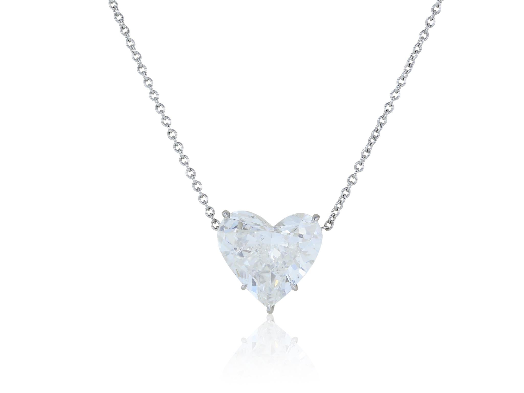 Platinum pendant consisting of one heart shaped diamond weighing 4.07 carats with a color and clarity of I/SI1 respectively, with GIA certificate 2181080736, prong set in a simple basket setting, suspended from a platinum chain 16 inches in length.