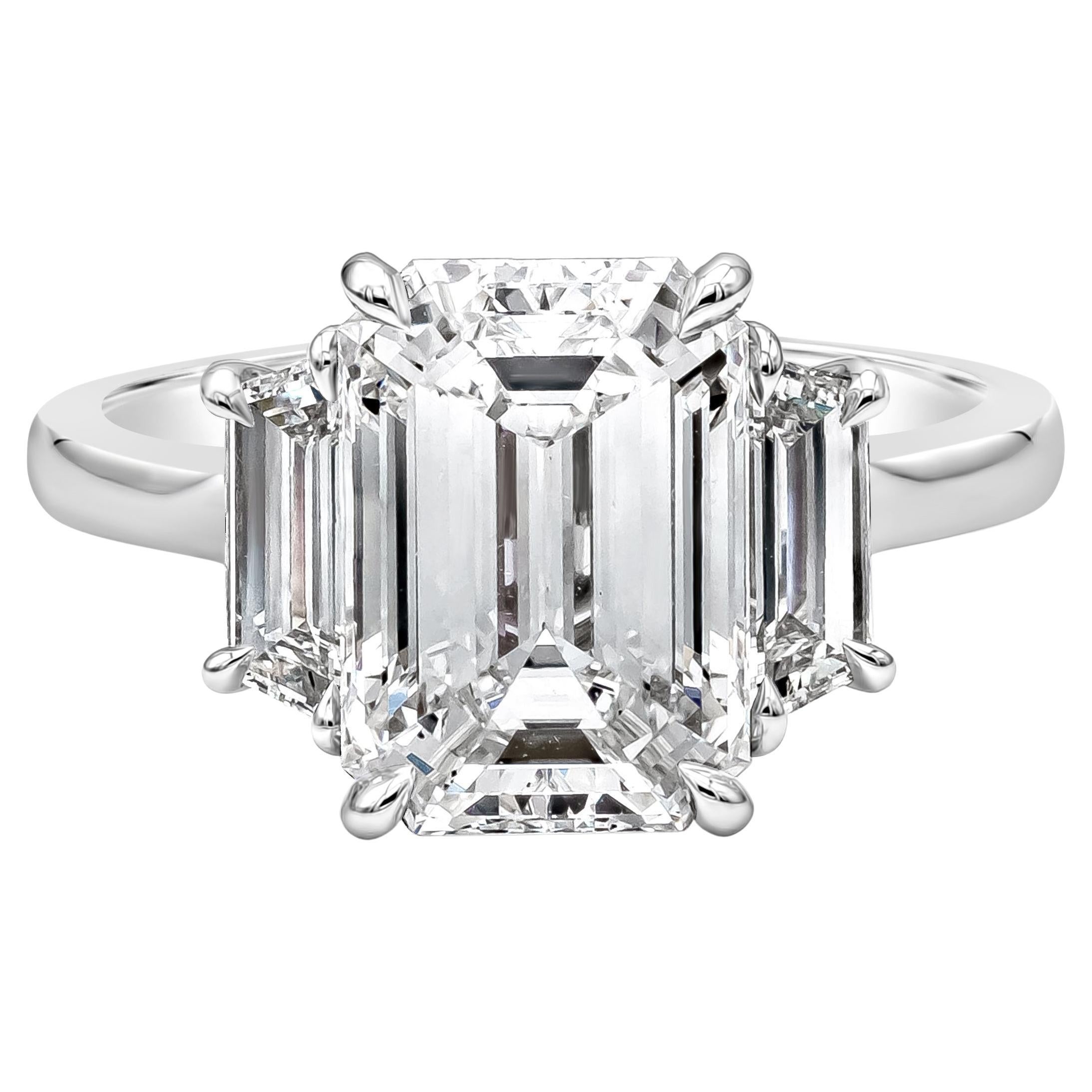 GIA Certified 4.07 Carats Emerald Cut Diamond Three-Stone Engagement Ring For Sale