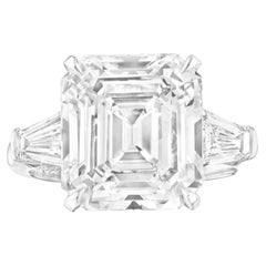 Anillo de compromiso de diamantes talla esmeralda con certificado GIA de 4.03 en platino con forma cónica