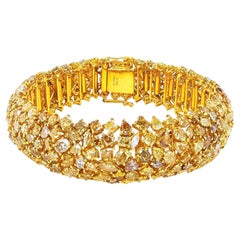 Bracciale in oro giallo con diamanti fantasia certificati GIA da 40,74 carati