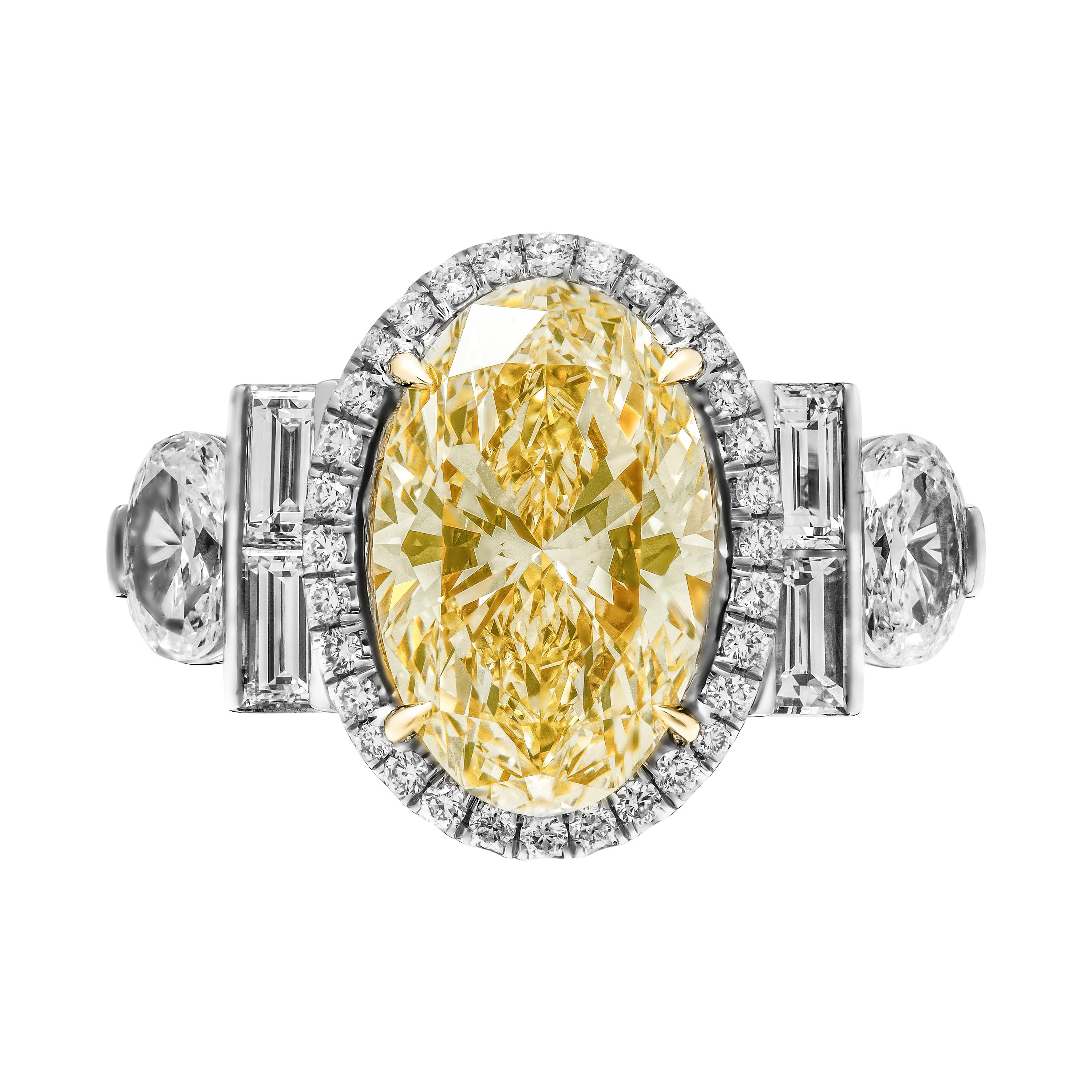 Mounted in handmade custom design setting featuring Platinum 950 & 22k Yellow Gold, 1 row of diamonds on the shank and fancy diamond U shape gallery under each stone, a true piece of art
Halo around center stone makes it appear larger and high end.