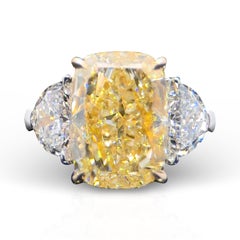 GIA Certified 4.09 Carat Cushion Cut Light Yellow Diamond Three Stone Ring