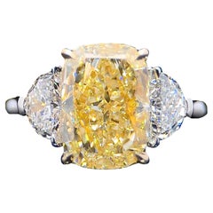 GIA Certified 4.09 Carat Elongated Cushion Cut Yellow Diamond Three Stone Ring