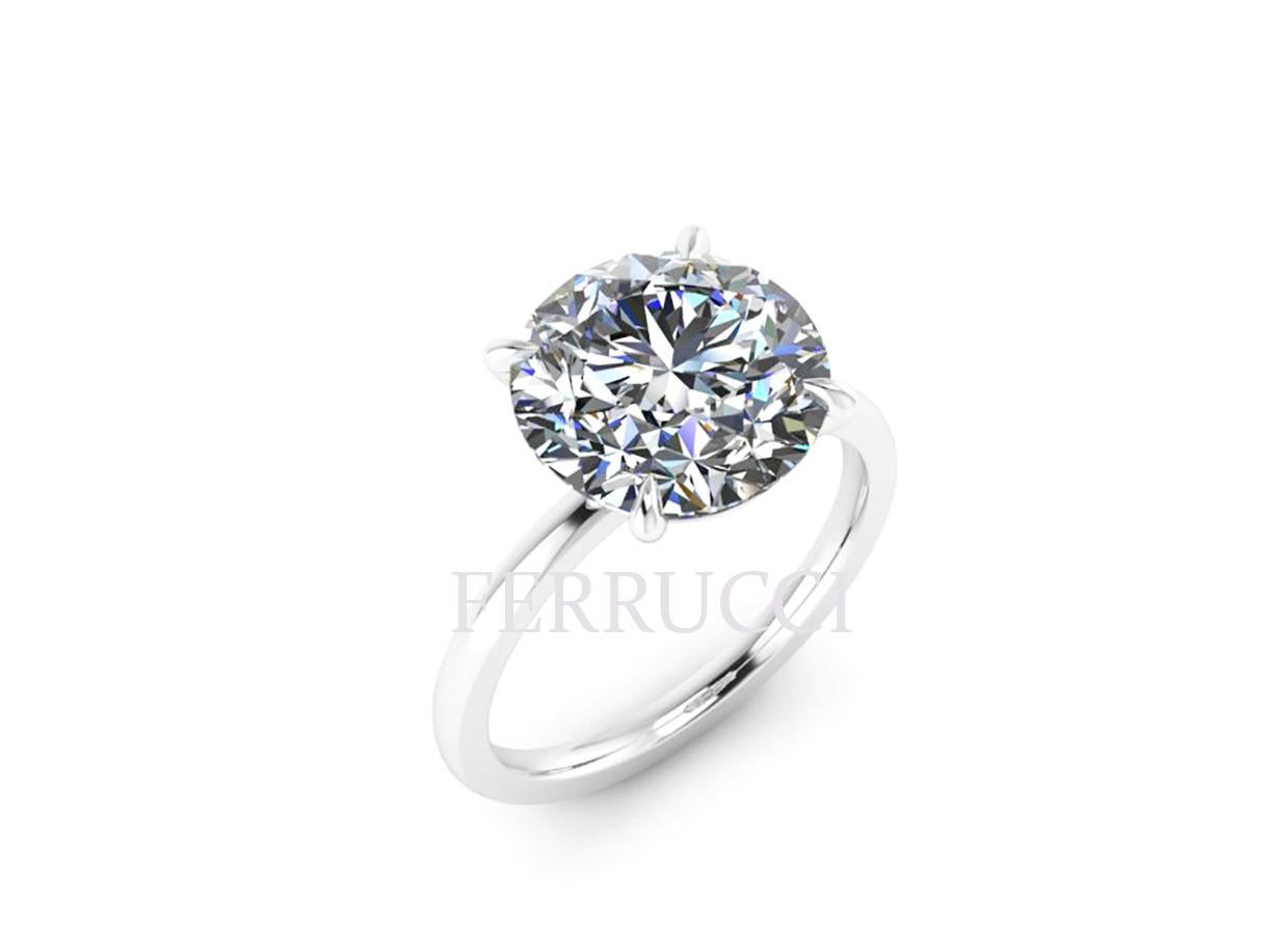 GIA Certified 4.09 carat, H color, VS1 clarity, no Fluorescence set low in a low setting style, platinum 950 solitaire ring.
Custom options for diamonds and settings are always available.

Ring size is 5  3/4 that can be sized upon order 
Our