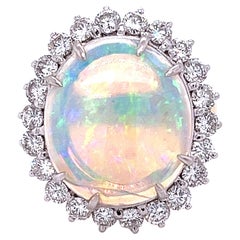 Used GIA Certified 4.09-carat White Opal and Diamond Halo in Platinum and Gold Ring